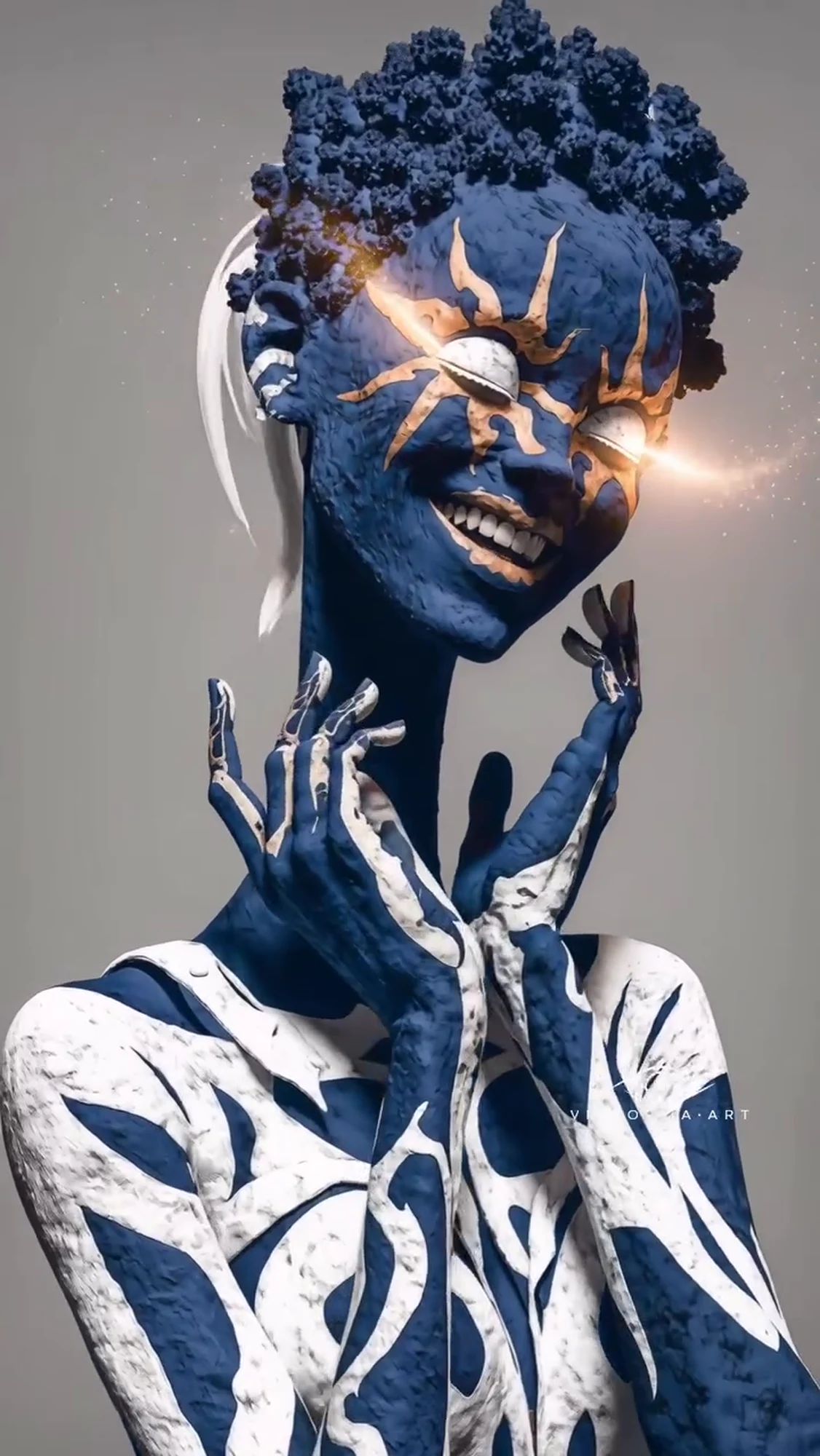 The Bloom, a smiling indigo bust with gold branches over its eyes