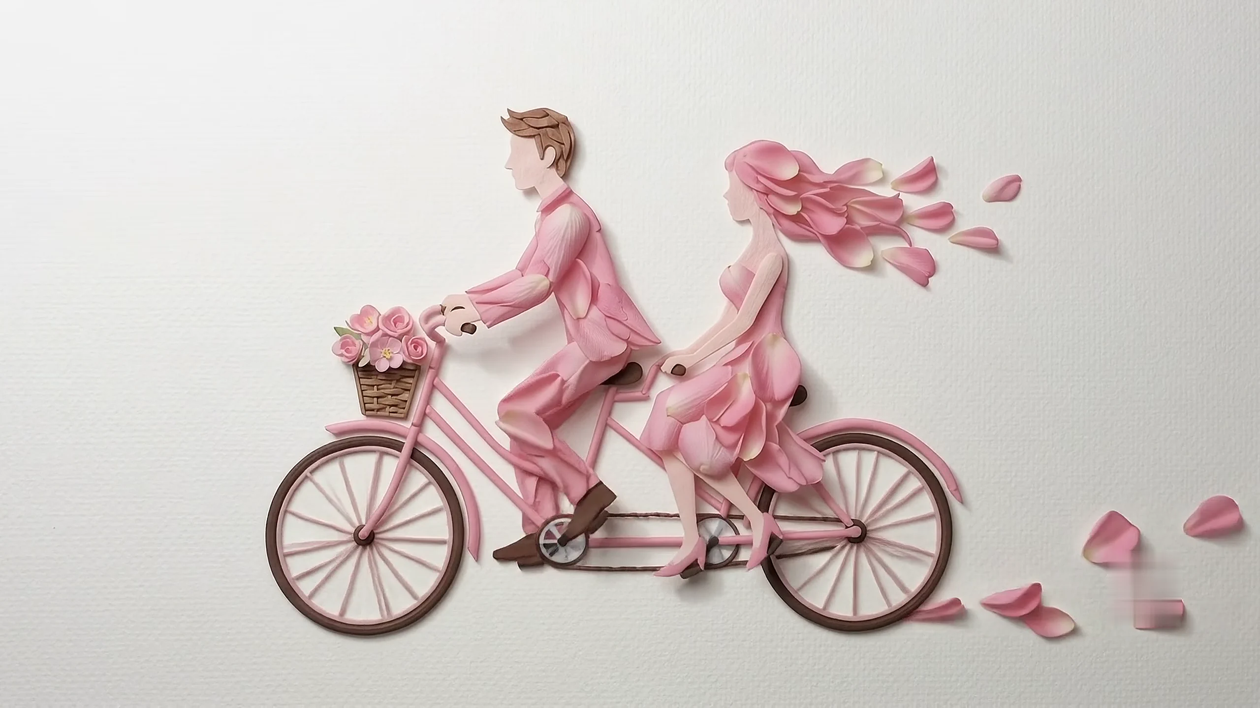 A couple riding a bicycle together, rendered in soft pink petals