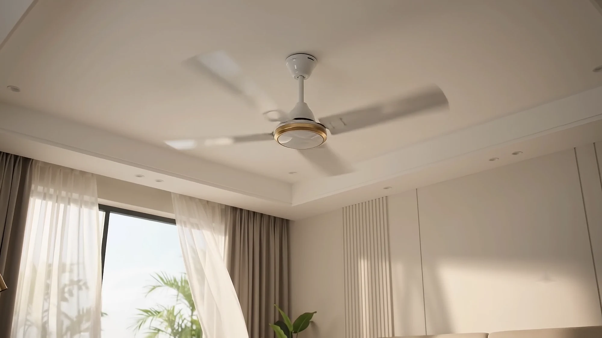 A Vorta ceiling fan turning in a warm bedroom with sheer curtains